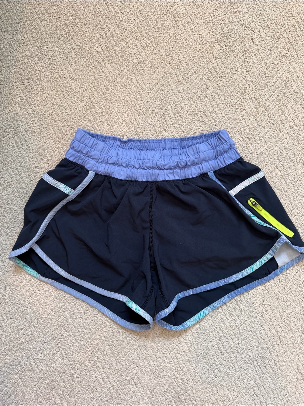 Women’s Black Athletic Shorts with Lavender Waistband and Neon Yellow Zip